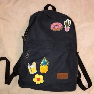 CANVAS BACKPACK W/ PATCHES ( charging station )